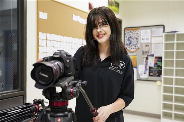 MULTIMEDIA TECHNOLOGY students working with cameras